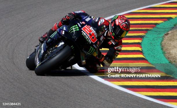 Monster Energy Yamaha's French rider Fabio Quartararo steers his motorbike during the qualifying session of the MotoGP German motorcycle Grand Prix...