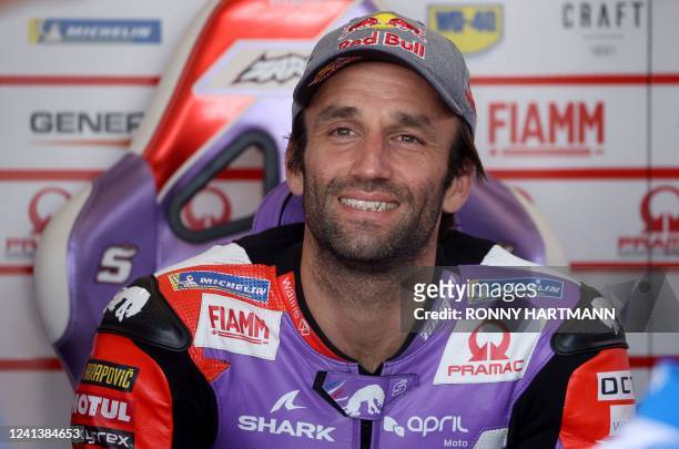 Ducati Pramac French rider Johann Zarco smiles as he sits in his box during the qualifying session of the MotoGP German motorcycle Grand Prix at the...
