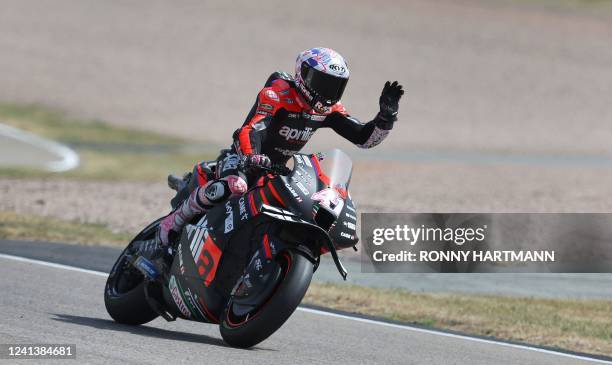 Aprilia Spanish rider Aleix Espargaro waves after the qualifying session of the MotoGP German motorcycle Grand Prix at the Sachsenring racing circuit...