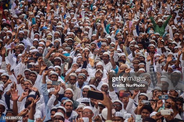 Muslim men shout slogans during an anti-government demonstration to demand the arrest of Bharatiya Janata Party member, Nupur Sharma on account of...