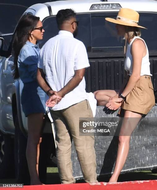 Meghan Markle is seen watching Prince Harry play polo on June 17, 2022 in Santa Barbara, California.