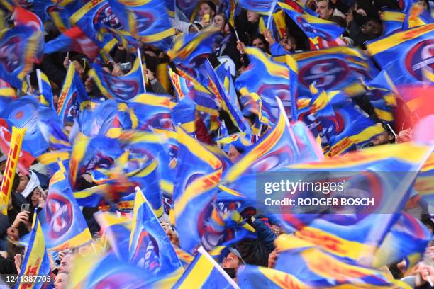 Stormers' supporters wave flags during the United Rugby Championship final rugby union match between Stormers and Bulls , at Cape Town Stadium on...