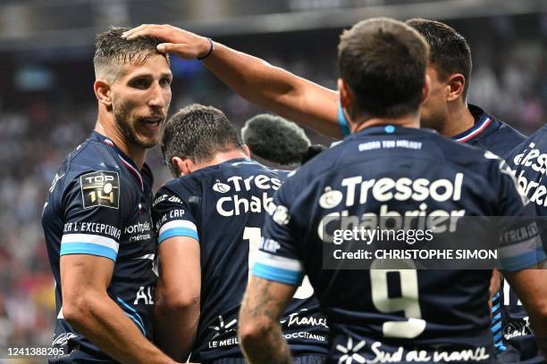 Montpellier's French wing Vincent Rattez celebrates after scoring a try during the French Top 14 semi-final rugby union match between Montpellier...