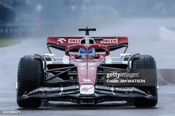 Alfa Romeo's Finnish driver Valtteri Bottas takes to the track in the rain during the third practice session for the Canada Formula 1 Grand Prix on...