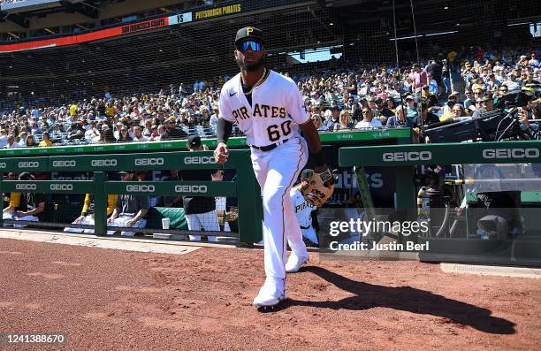 Liover Peguero of the Pittsburgh Pirates takes the field in the first inning of his MLB debut during the game against the San Francisco Giants at PNC...