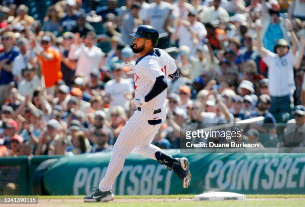 Riley Greene of the Detroit Tigers rounds first base after getting his first Major League hit, a single, during the second inning of a game against...