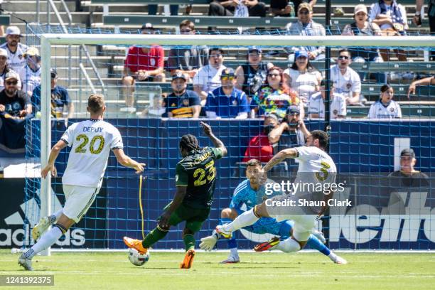 Yimmi Chará of Portland Timbers scores a goal as Jonathan Bond of Los Angeles Galaxy attempts to make a save during the match at the Dignity Health...