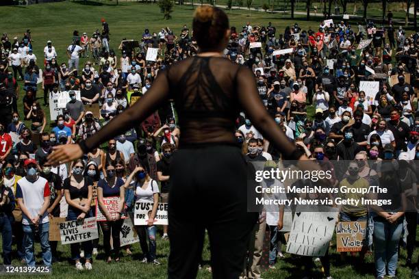 Protesters listen to a speaker before marching in Dublin on Monday, June 1 the fourth day of Bay Area protests over the killing of George Floyd in...