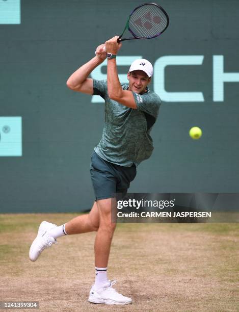 Poland's Hubert Hurkacz returns a ball to Russia's Daniil Medvedev during the men's singles final match at the ATP 500 Halle Open tennis tournament...