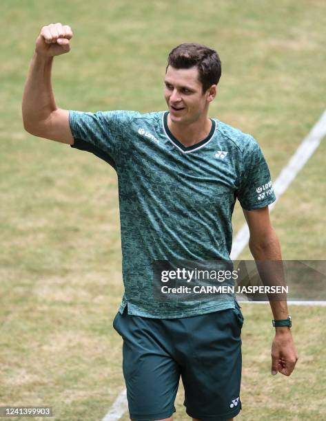 Poland's Hubert Hurkacz celebrates after his singles final match against Russia's Daniil Medvedev at the ATP 500 Halle Open tennis tournament in...