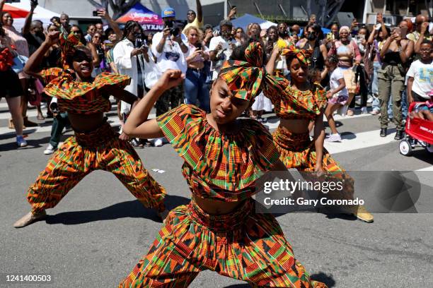 Zoria Gardner left, Kaylen Brown and Phynnesc Jackson of the Victory Dancers Crenshaw District dance team, dances to music played by the DJ at the...