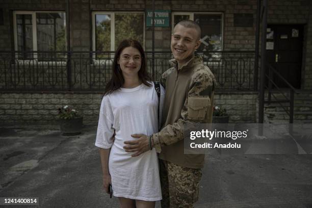 Year old Ukrainian soldier codenamed Anton fighting at the front against Russia for months poses for a photo with his pregnant wife during the...