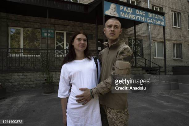 Year old Ukrainian soldier codenamed Anton fighting at the front against Russia for months poses for a photo with his pregnant wife during the...