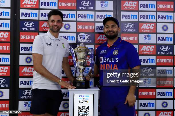 Keshav Maharaj of South Africa and Rishabh Pant of India with the series trophy as match is called of due to rain during the 5th T20 International...