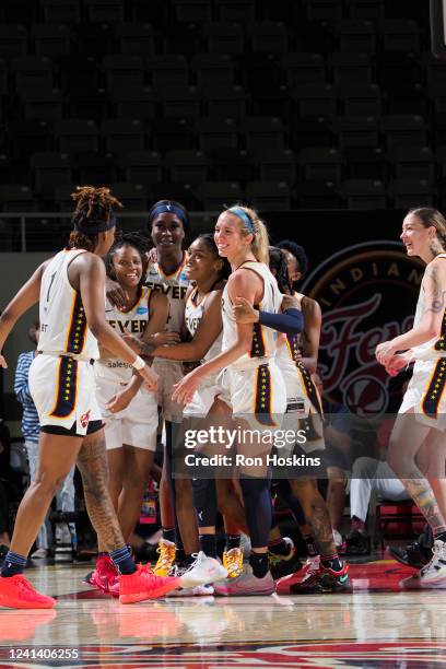 The Indiana Fever celebrate after the game against the Chicago Sky on June 19, 2022 at Gainbridge Fieldhouse in Indianapolis, Indiana. NOTE TO USER:...