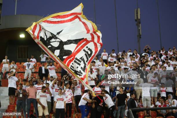 Zamalek fans show their support during the Egyptian Premier League week 20 match between Al Ahly and Zamalek at Al Salam Stadium in Cairo, Egypt on...