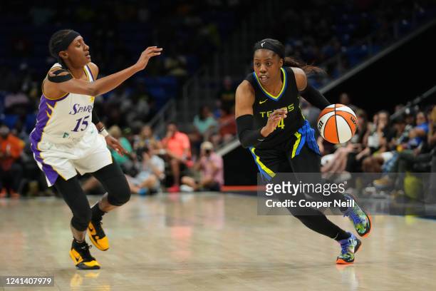 Arike Ogunbowale of the Dallas Wings drives to the basket during the game against the Los Angeles Sparks on June 19, 2022 at the College Park Center...