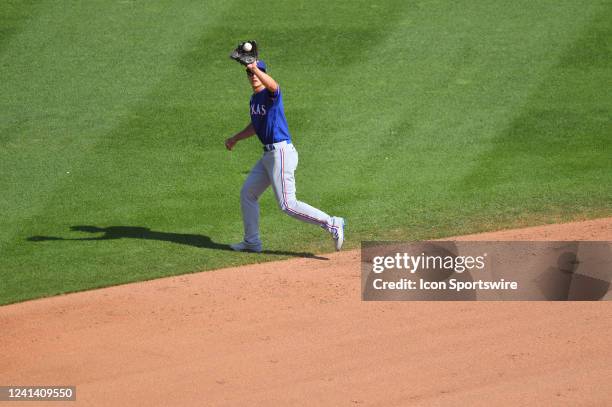 Texas Rangers 2B Brad Miller catches a low, line drive during the game between Texas Rangers and Detroit Tigers on June 18, 2022 at Comerica Park in...
