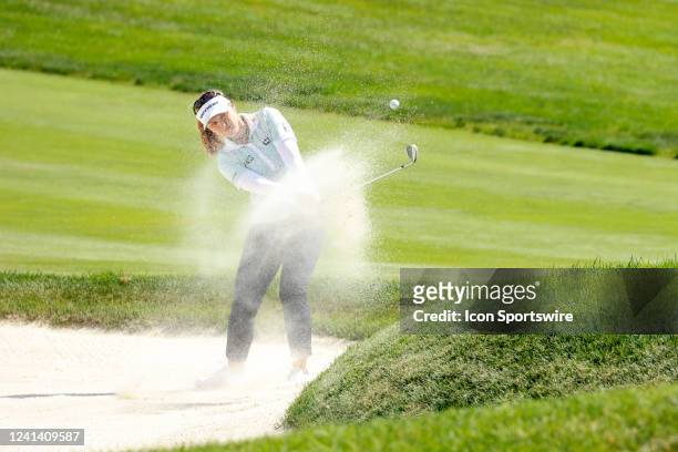 Golfer Brooke Henderson hits out of a sand trap on the 10th hole during the Meijer LPGA Classic For Simply Give on June 19 at the Blythefield Country...