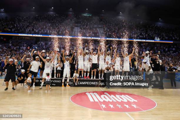 Real Madrid players celebrate their victory after the Liga Endesa 2021/2022 at Wizink Center.