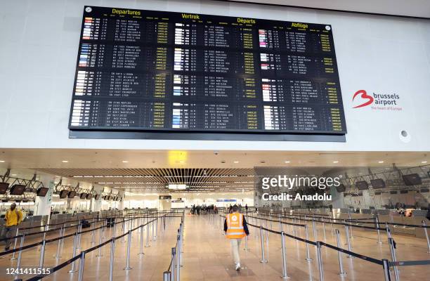 Flight information board shows cancelled flights at the Brussels airport as passenger planes will not take off due to security guards strike in...