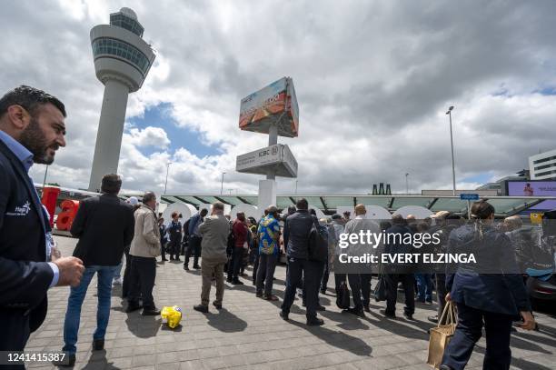 Schiphol Airport cleaning staff protest outside the airport in The Netherlands, on June 20 as they temporarily stopped working due to dissatisfaction...