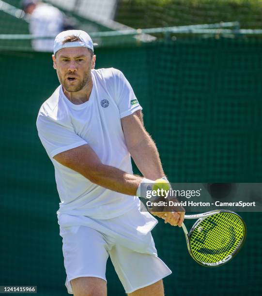 Illya Marchenko in action against Jesper De Jong in the first round of men's singles matches of the Wimbledon 2022 qualifying tournament at the Bank...