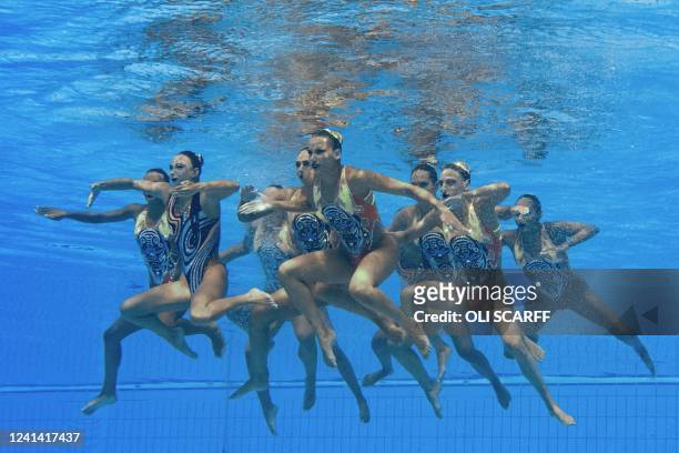 Greece's team competes in the women's team free combination artistic swimming finals during the Budapest 2022 World Aquatics Championships at the...