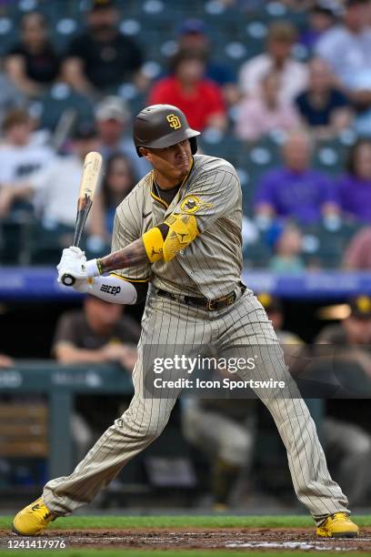 San Diego Padres third baseman Manny Machado bats during a game between the San Diego Padres and the Colorado Rockies at Coors Field on June 17, 2022...