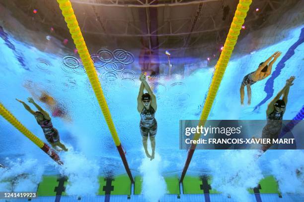 S Katie Grimes , USA's Katie Ledecky and Italy's Simona Quadarella compete in the women's 1500m freestyle finals during the Budapest 2022 World...