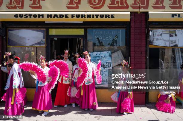 Los Angeles, CA Members of the Kim Eung HWA & Korean Dance Company wait for the start of the Kingdom Day Parade Monday, June 20, 2022. After two...