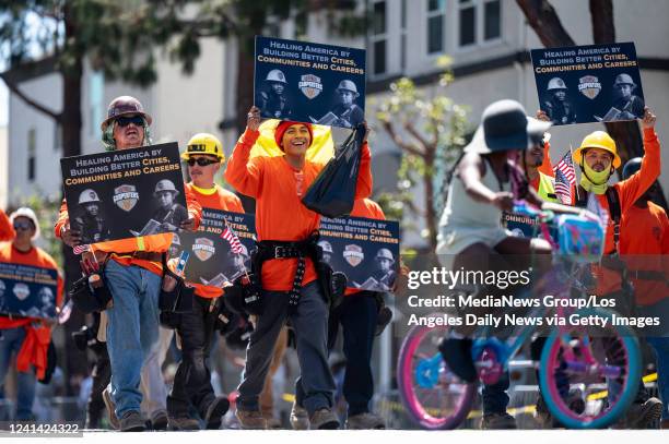 Los Angeles, CA Members of the Carpenters Union march in the Kingdom Day Parade Monday, June 20, 2022. After two cancellations caused by the COVID-19...