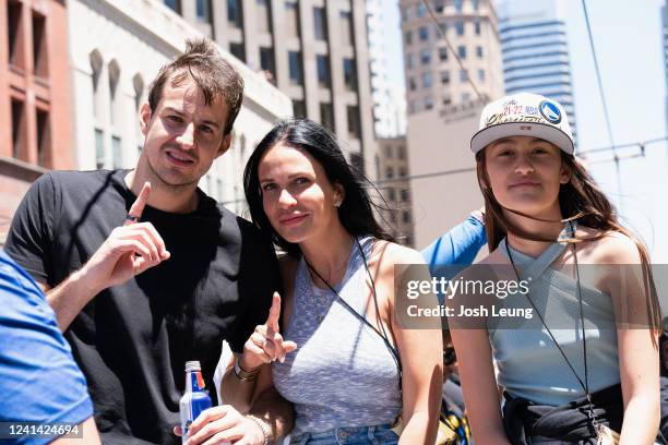 Nemanja Bjelica of the Golden State Warriors poses for a photo with his wife Mirjana Bjelica during the 2022 Victory Parade & Rally on June 20, 2022...