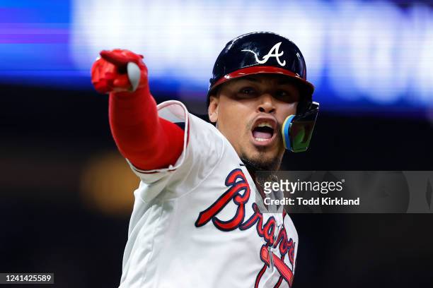 Orlando Arcia of the Atlanta Braves reacts after hitting a walk off game winning single during the ninth inning against the San Francisco Giants at...