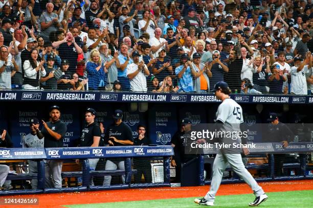 Gerrit Cole of the New York Yankees receives a standing ovation during a pitching change in the eighth inning against the Tampa Bay Rays at Tropicana...