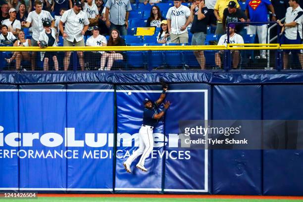Manuel Margot of the Tampa Bay Rays misses a hit off Aaron Hicks of the New York Yankees in the ninth inning during the game between the New York...