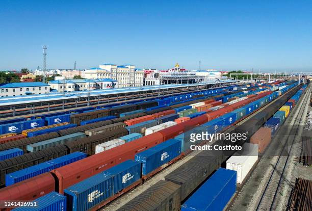 Aerial photo taken on June 21, 2022 shows inbound and outbound China-Europe freight trains at the Manzhouli railway port in Hulunbuir, North China's...