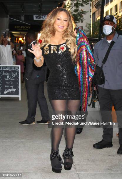 Mariah Carey, wearing a sequined dress with the movie title "Bros" on it, is seen on June 20, 2022 in New York City.