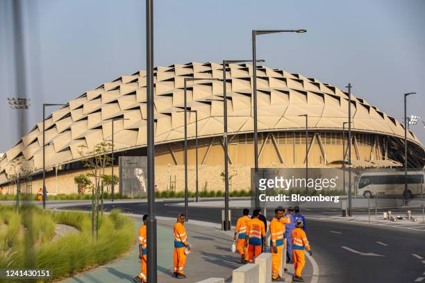Workers outside the metro station serving the Al Thumama football stadium in Doha, Qatar, on Monday, June 20, 2022. The stadium will be a venue for...