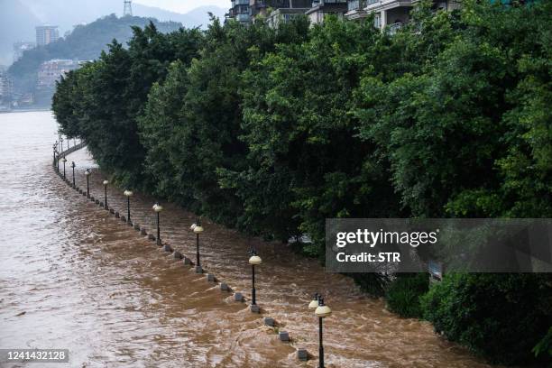 This picture shows a flooded area after heavy rains in Shaoguan in China's southern Guangdong province on June 21, 2022. - China OUT / China OUT