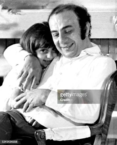 The late Lebanese composer Assi Rahbani, husband of the Arab world's most renowned living diva Fairuz , hugs his youngest daughter Reema in a picture...