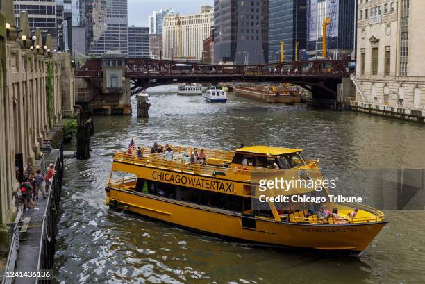 Wendella water taxi departs a stop in 2018 near the Ogilvie Transportation Center along the Chicago River.