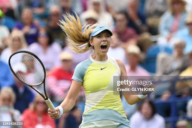 Britain's Katie Boulter celebrates after winning against Czech Republic's Karolina Pliskova during their round of 16 women's singles tennis match on...