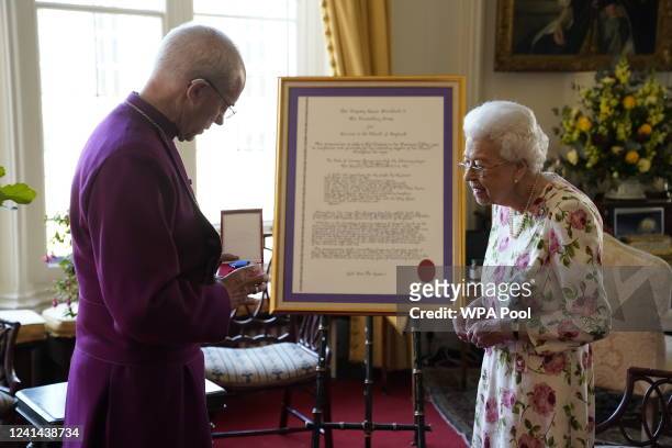 Queen Elizabeth II receives the Archbishop of Canterbury Justin Welby at Windsor Castle, where he presented her with a special 'Canterbury Cross' for...