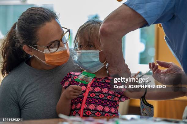 Three year old receives her Covid-19 vaccination, with Moderna, at Temple Beth Shalom in Needham, Massachusetts on June 21, 2022. The temple was one...