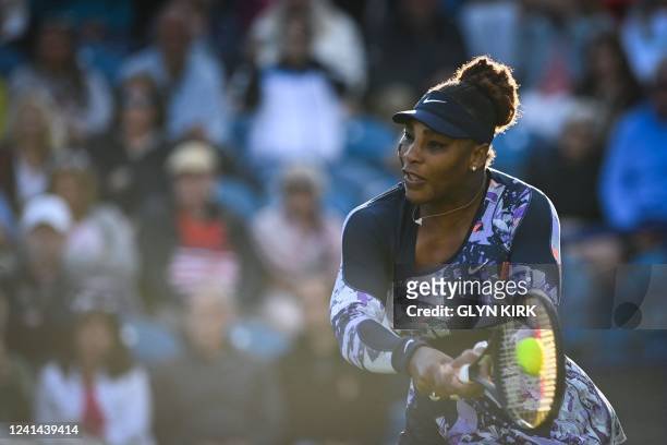 Player Serena Williams returns the ball to Spain's Sara Sorribes Tormo and Czech Republic's Marie Bouzkova during her round of 8 women's doubles...
