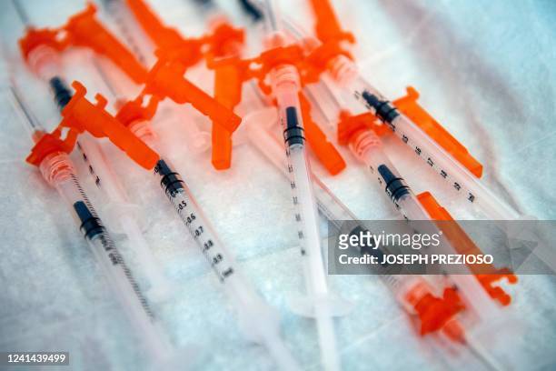 Syringes containing the Moderna Covid-19 vaccination for 6 month olds to 5 year olds lay on a table waiting to be used at Temple Beth Shalom in...