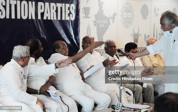 Leader Tiruchi Siva, Congress leaders Jairam Ramesh and Mallikarjun Kharge, NCP leader Sharad Pawar, SP leader Ram Gopal Yadav and CPI leader Sitaram...