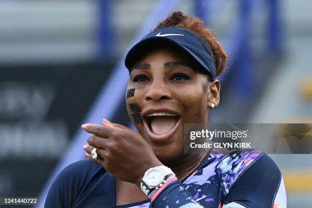 Player Serena Williams celebrates after winning with Tunisia's Ons Jabeur against Spain's Sara Sorribes Tormo and Czech Republic's Marie Bouzkova at...