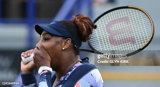 Player Serena Williams celebrates after winning with Tunisia's Ons Jabeur against Spain's Sara Sorribes Tormo and Czech Republic's Marie Bouzkova at...